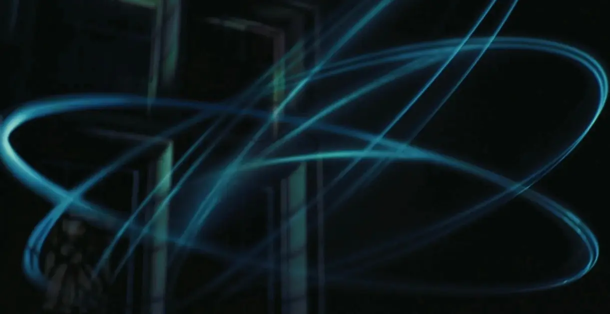 Abstract background with blue light streaks and orbital patterns